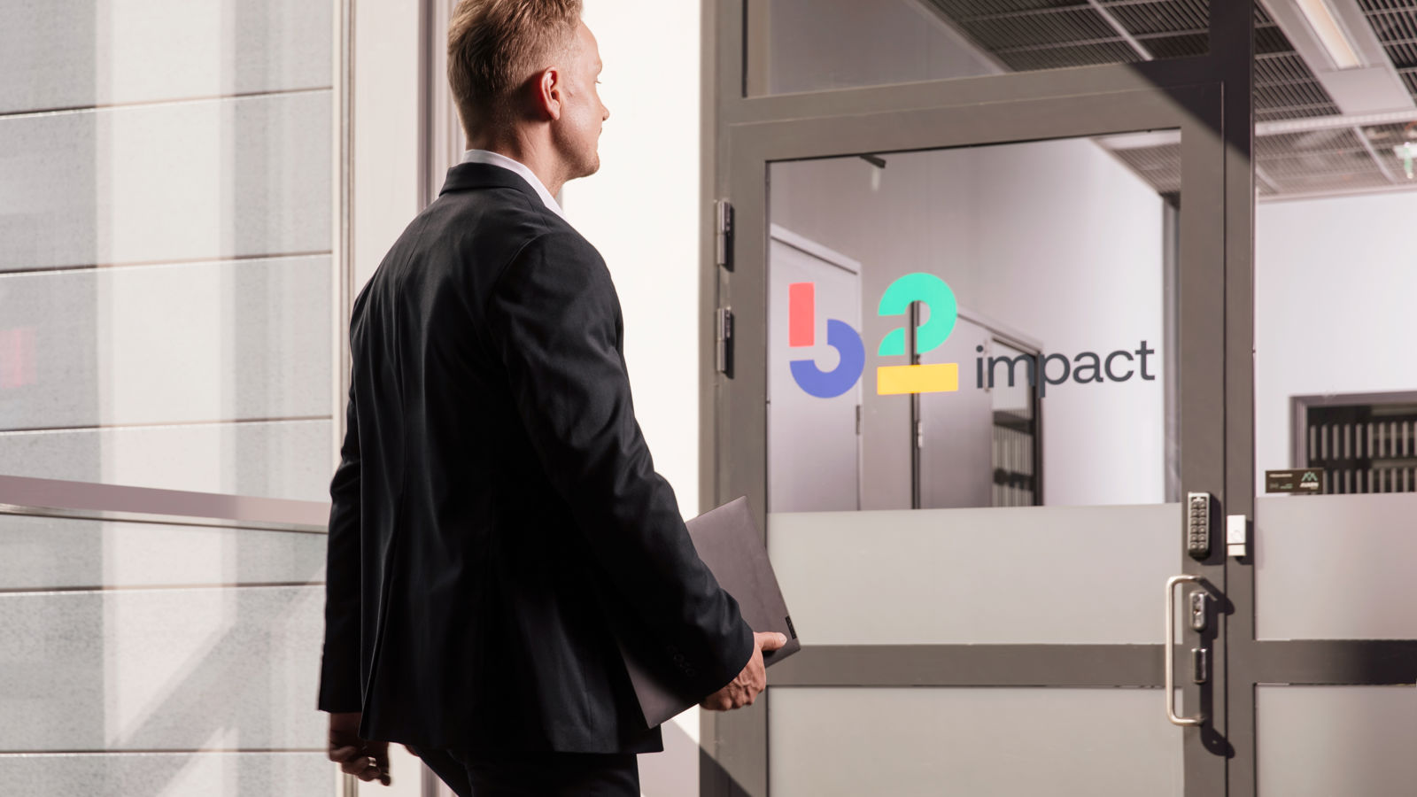 Man walking in a modern office building